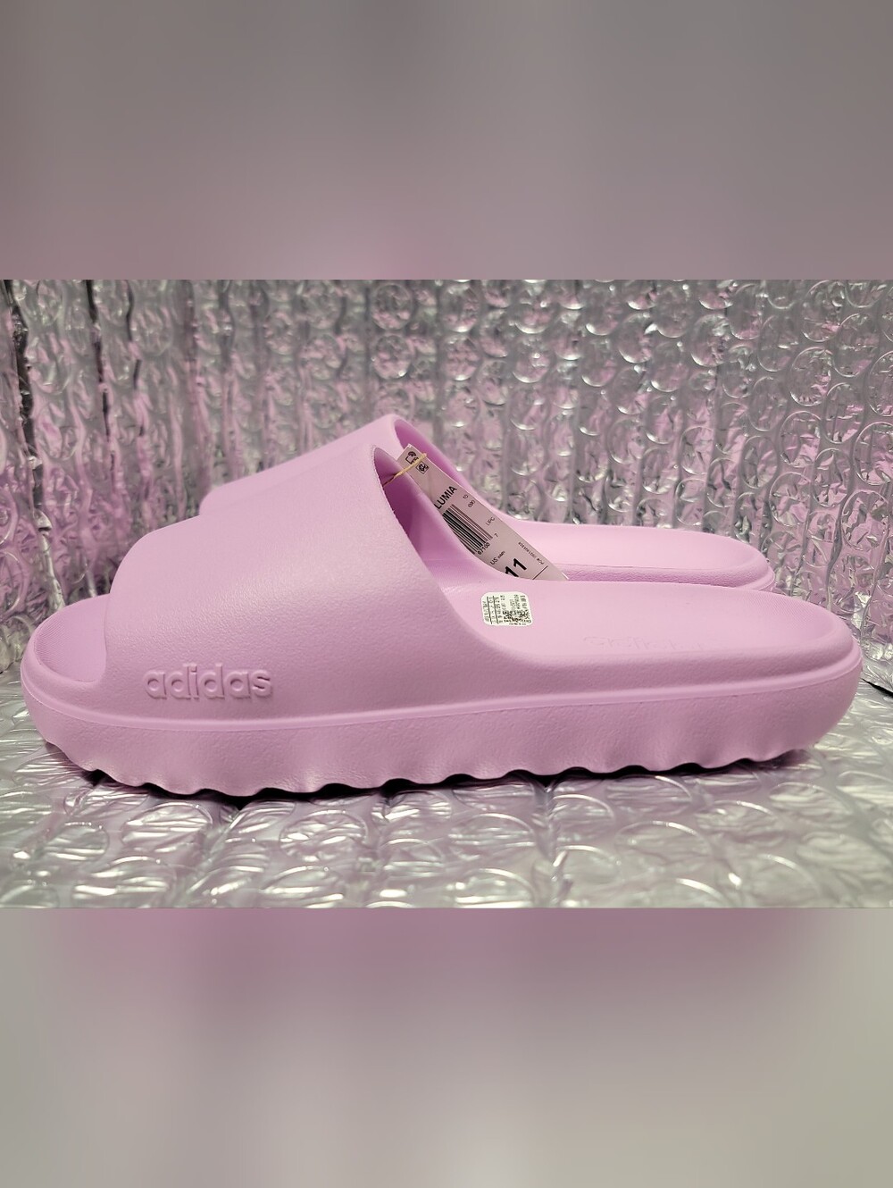 Adidas Adilette Lumia Slides in a light purple (Bliss Lilac)